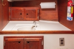 Head Sink and Teak Cabinets